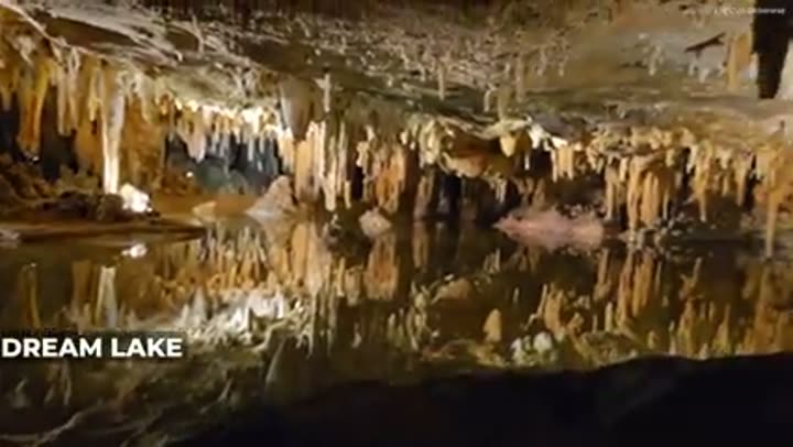 Dream Lake reflects stunning stalactites and stalagmites within Virginia's subterranean cave systems.