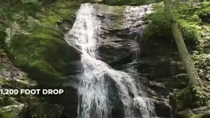 A majestic 1,200-foot waterfall cascades down, a true mountain wonder in Virginia.