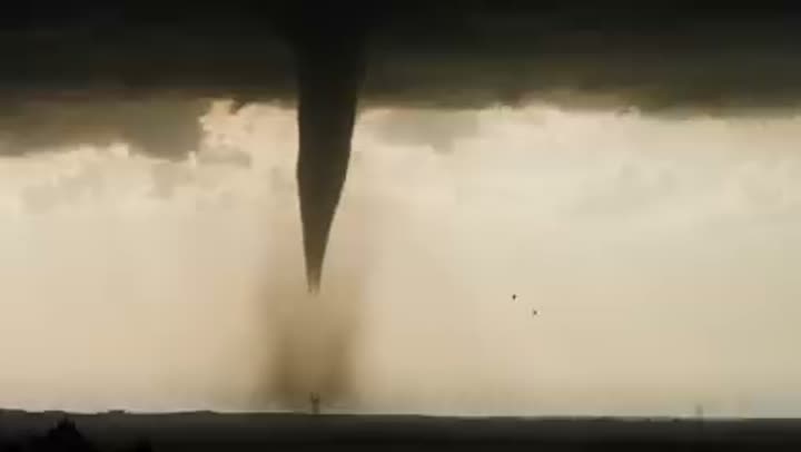 A powerful tornado touching down, illustrating Oklahoma's notorious severe weather.