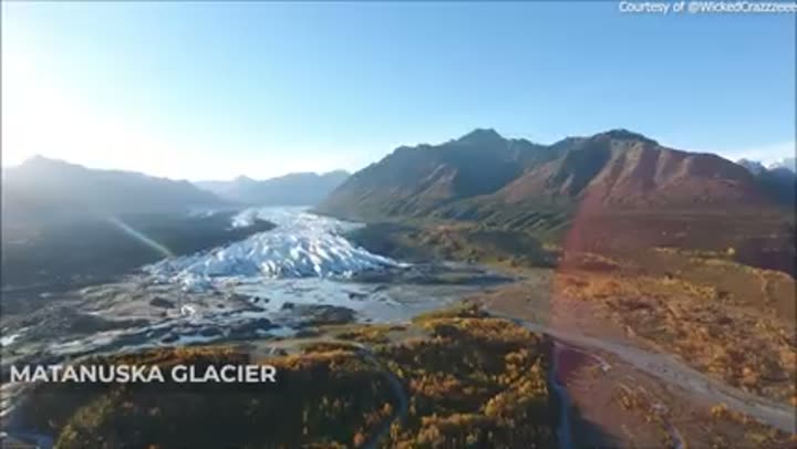 Majestic aerial view of the Matanuska Glacier, a massive river of ice.
