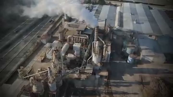 An aerial view of an active industrial plant, symbolizing towns forged by industry.