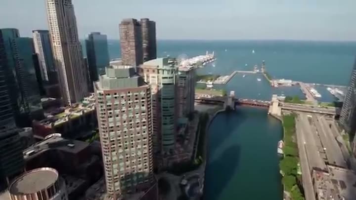 Aerial view of a bustling American metropolis, its luster potentially fading.
