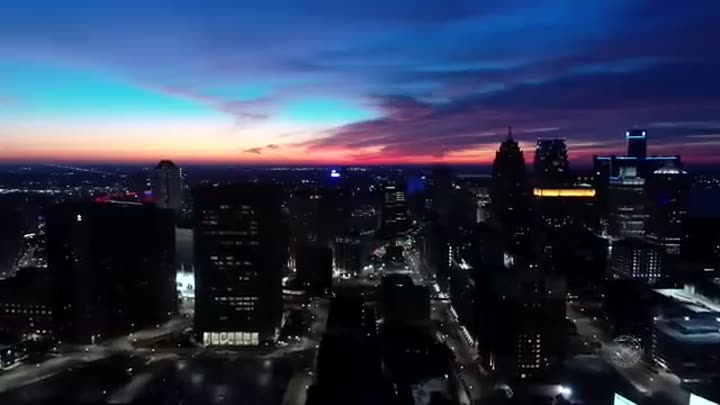 Detroit's skyline at dusk, illustrating the challenges faced by Motor City.